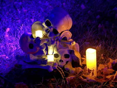 A pile of bones lit by candles.