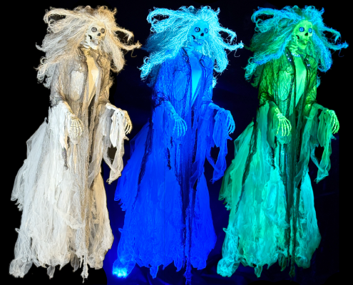 A screaming Banshee in regular light, blacklight, and the dark in which she glows.