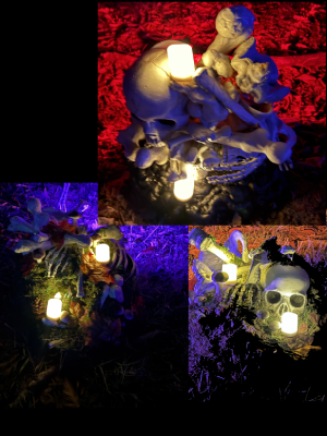 3 bonepiles with candles to light them