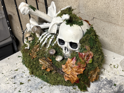 A work in progress of a mossy bone pile.